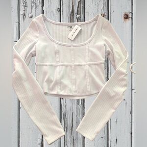 PAC Sun long sleeve crop top in size xsmall